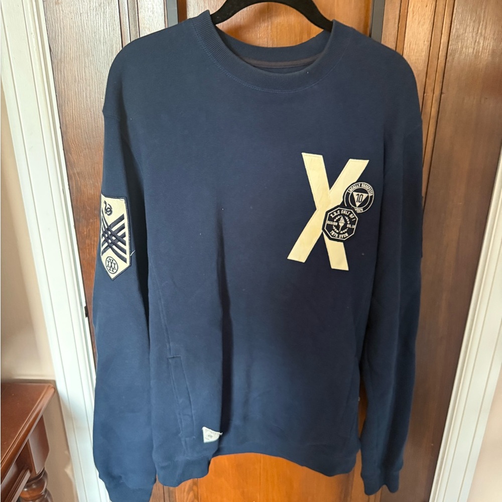 10.Deep Navy Crewneck Sweater with Cream Patch Detail